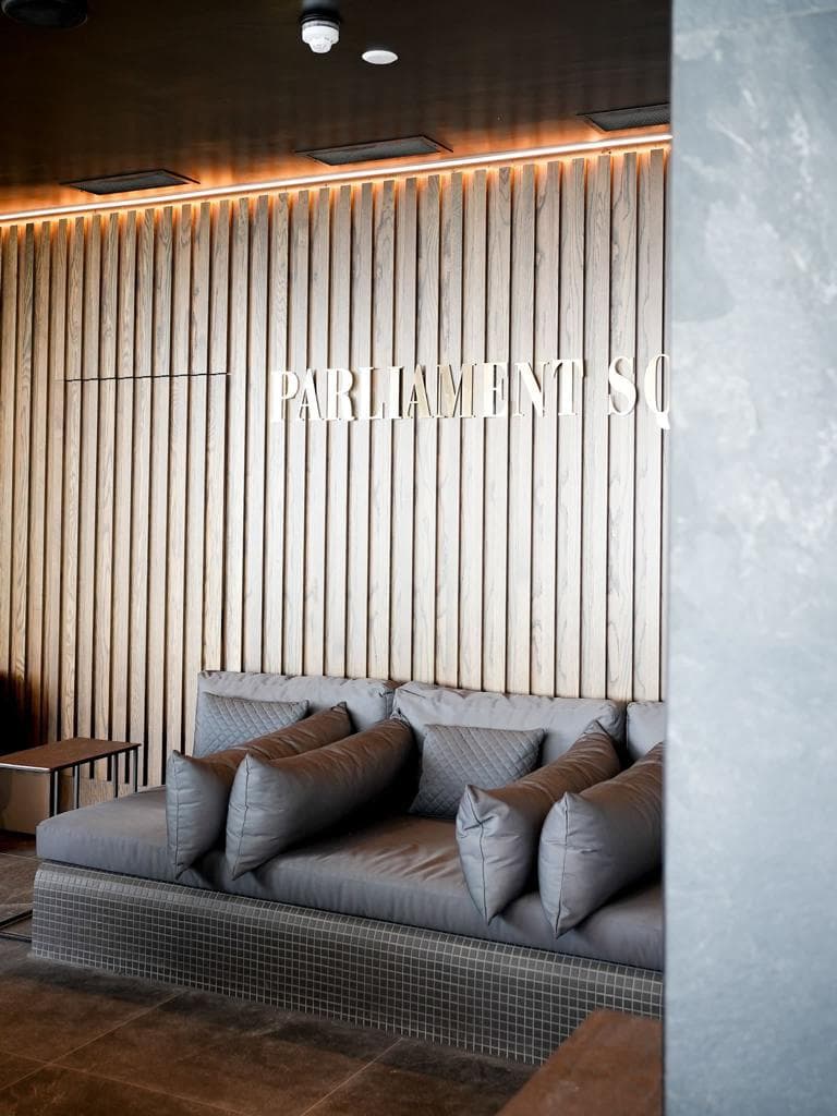 The wood-slat lounge settle at Jayde Spa Liverpool.